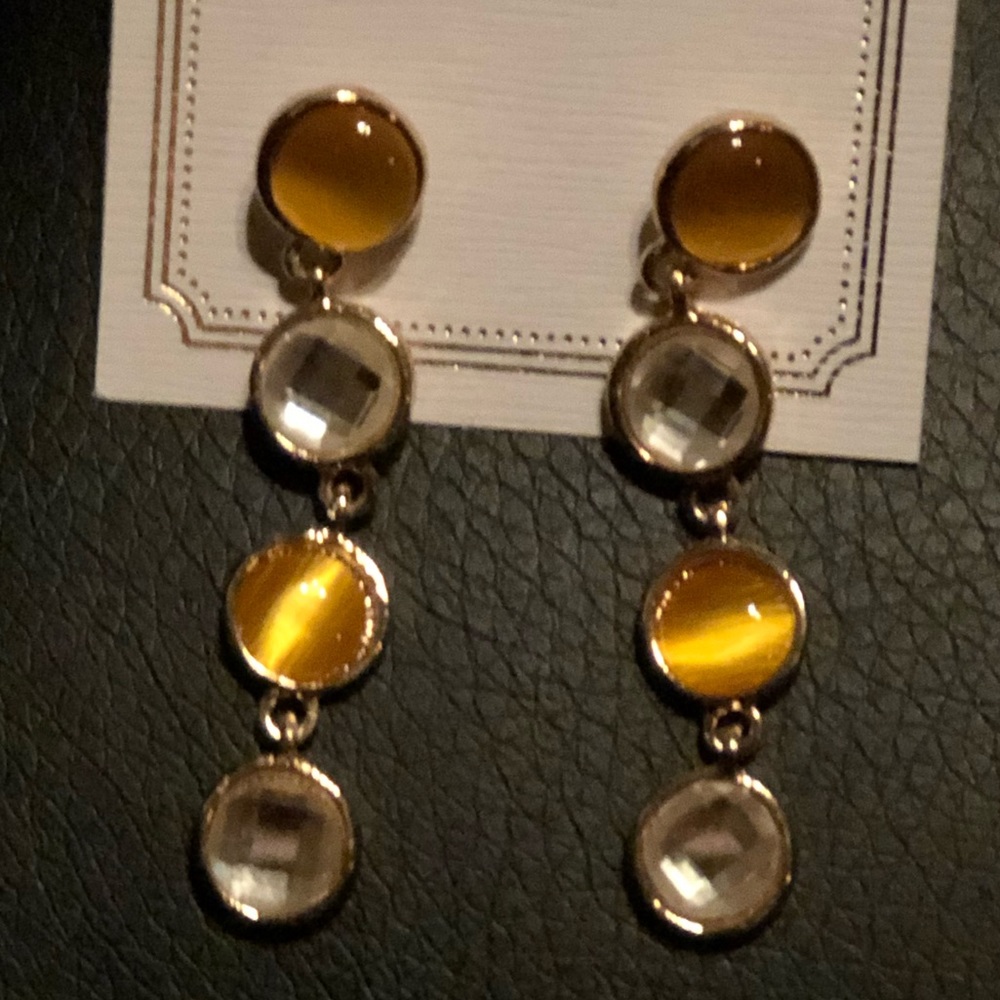 Green stone with gold metal trim dangle earrings